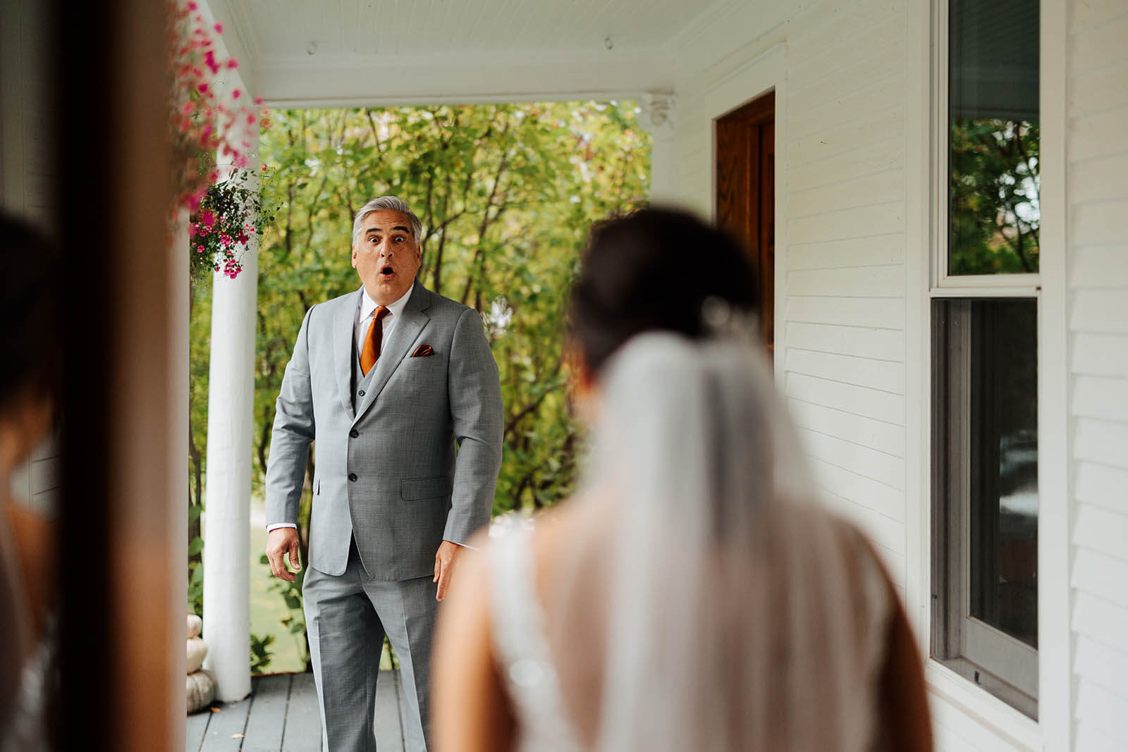 Starry Night Barn wedding photographer Suttons Bay Michigan candid father of bride shocked jaw drop emotional first look reaction on porch, top Northern Michigan wedding photography
