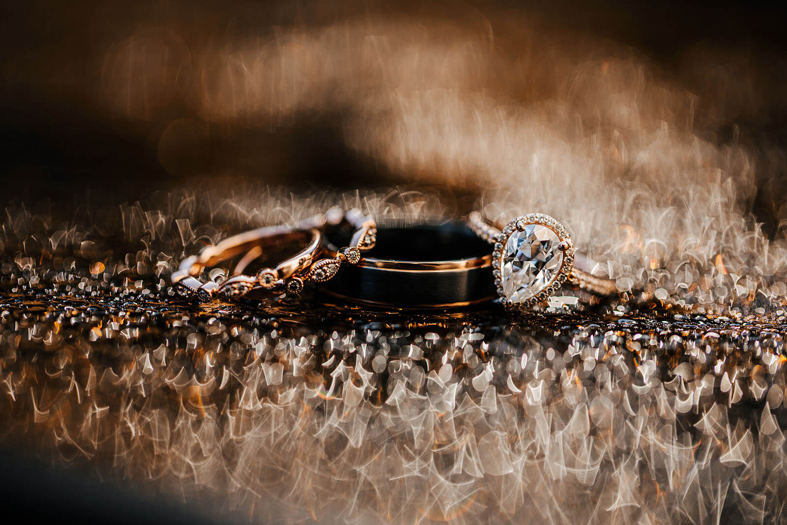 Luxury diamond ring detail with macro bokeh light at Radisson Plaza wedding in Kalamazoo Michigan