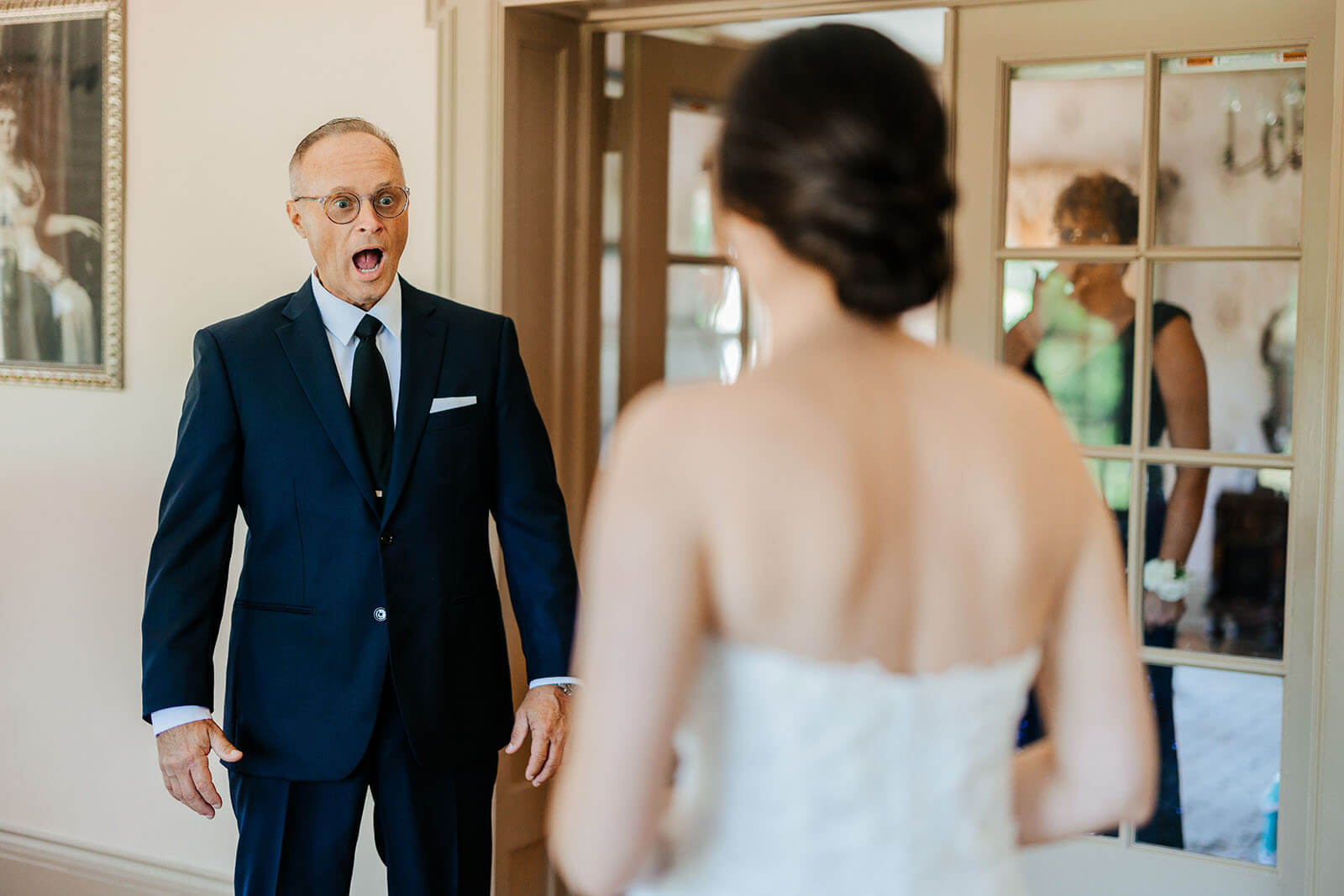 Candid father of the bride shocked reaction during first look at Felt Estate wedding in Saugatuck Michigan