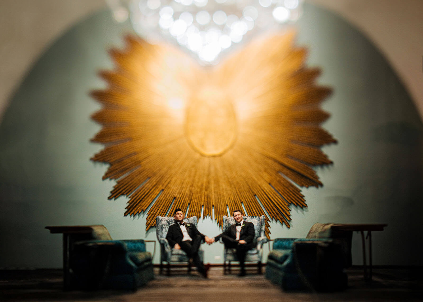 Intimate bride and groom nose to nose with pearl pins at Amway Grand Plaza wedding in Grand Rapids Michigan