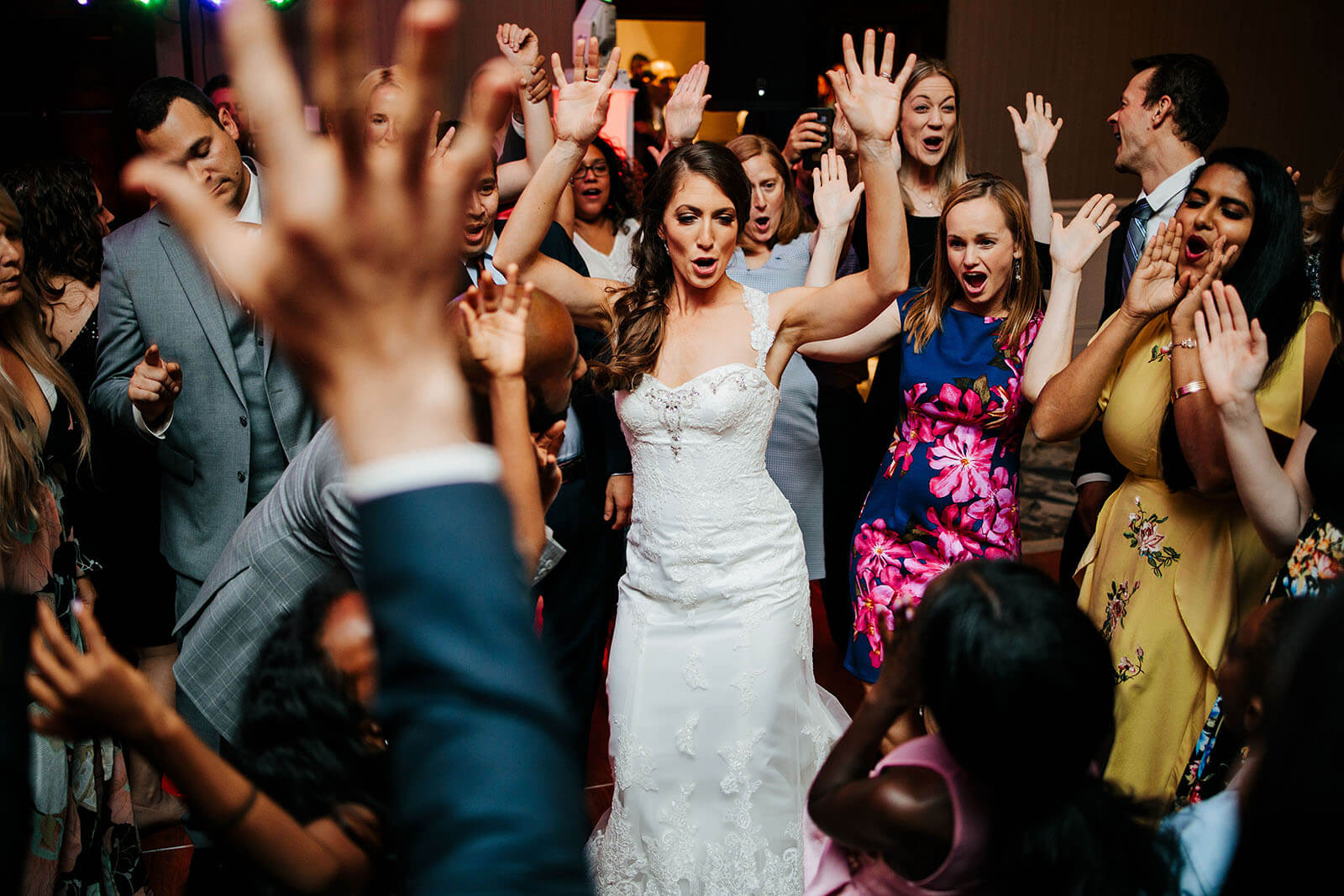 Bride and groom with corgi dogs on grass at Kensington Hotel wedding in Ann Arbor Michigan