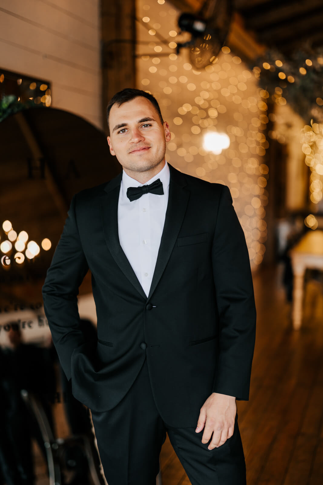 Groom in black tuxedo portrait at Westers Family Winery October wedding