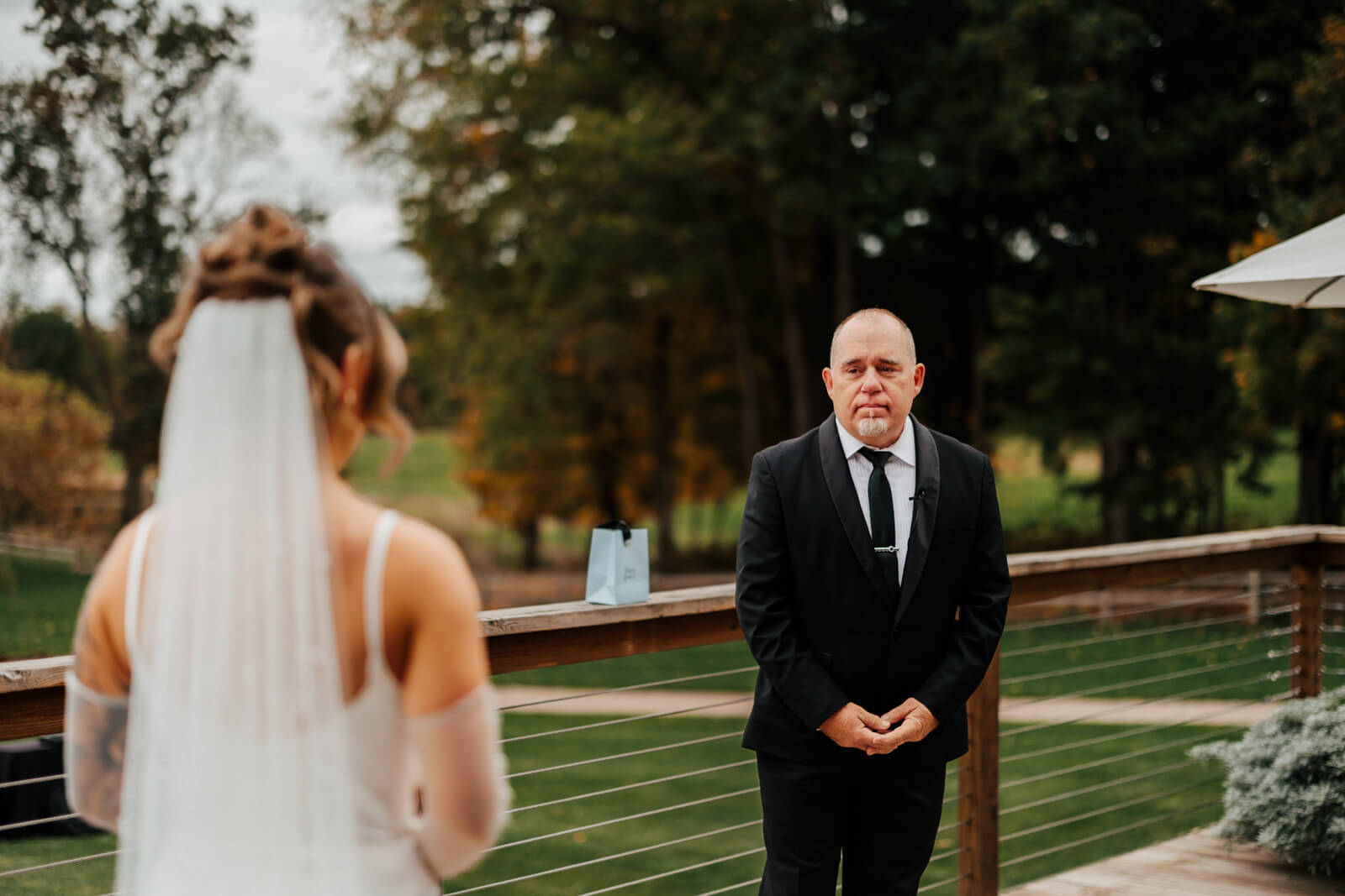 Father turning around to see bride for the first time on wedding day