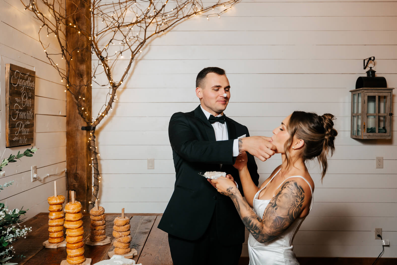 Bride laughing while dancing with groom at Westers Family Winery wedding reception