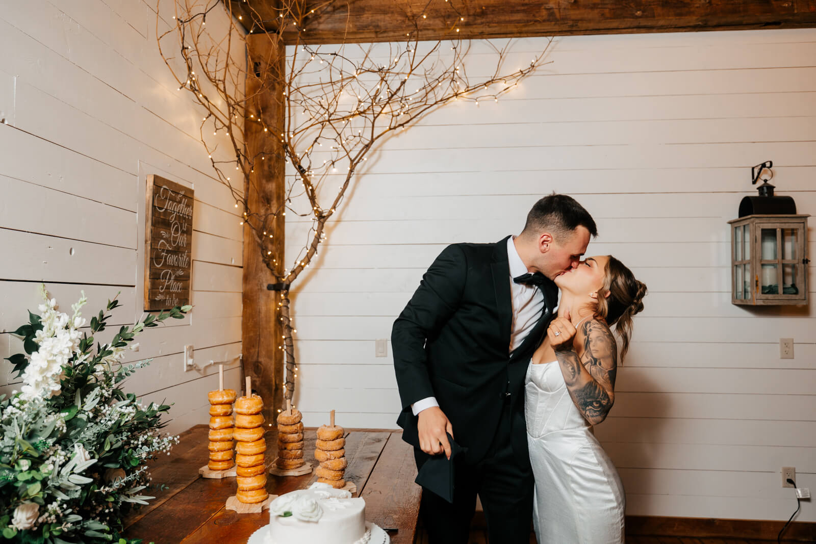 Bride and groom kissing on dance floor at Westers Family Winery reception