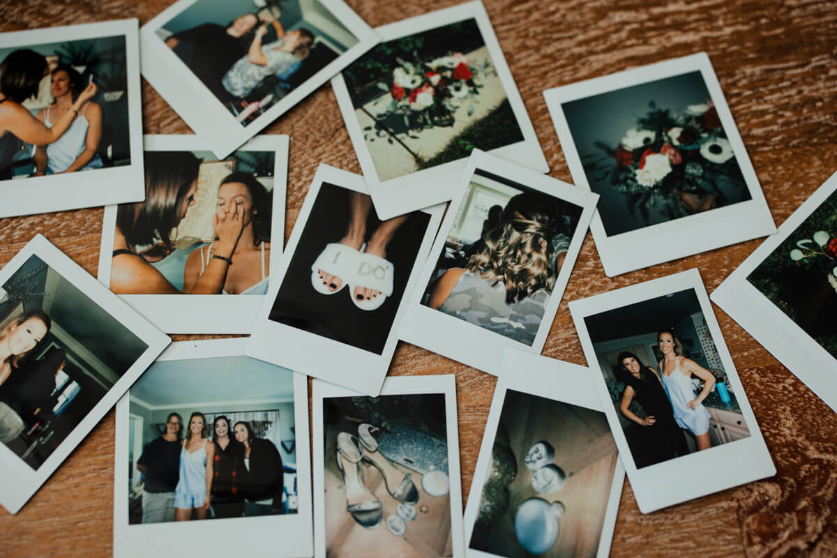 Polaroid flat lay of wedding getting ready moments including bride portraits flowers shoes and I Do sandals